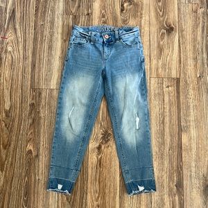 Girls size 8 Justice Jeans. Light, distressed color